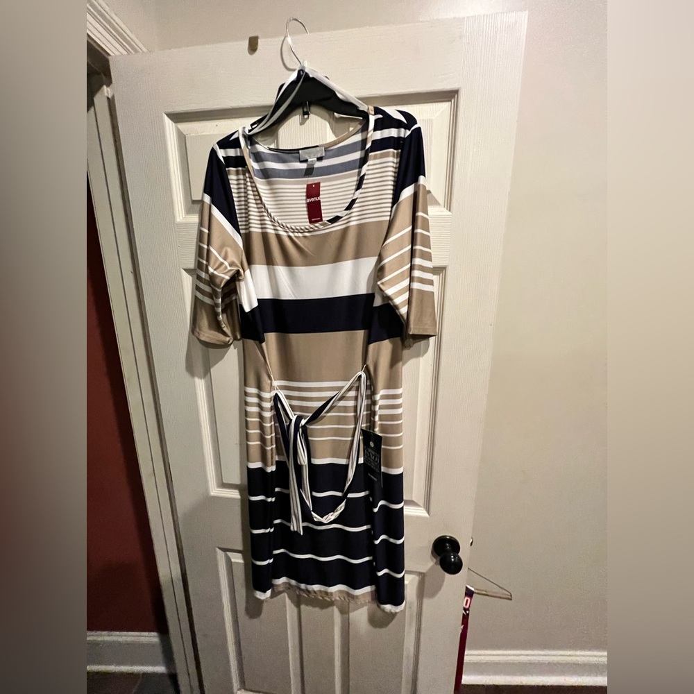 Brand new size 18/20 avenue dress with tags.